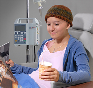 Teen girl having infusion treatment.