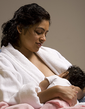 Woman breastfeeding baby.